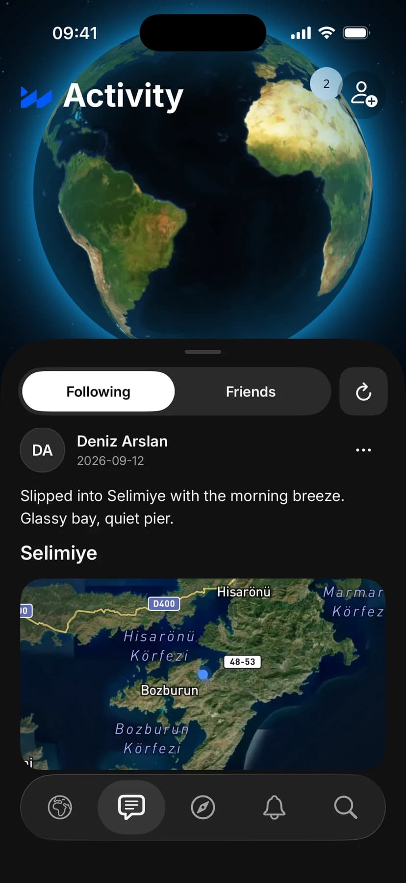 The activity feed with a shared visit card, its map, photos, likes and comments